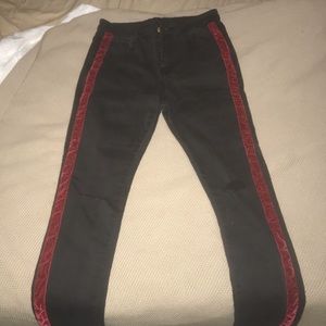 Black jeans with red velvet stripe down the side!
